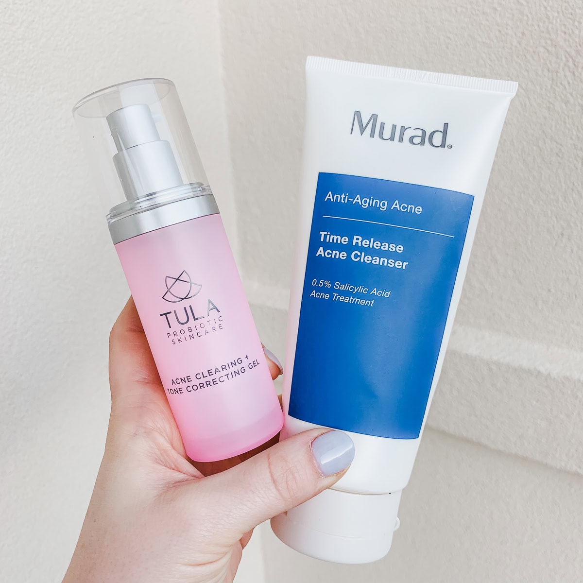 The Tula Acne Clearing + Tone Correcting Gel and the Murad Time Release Acne Cleanser.