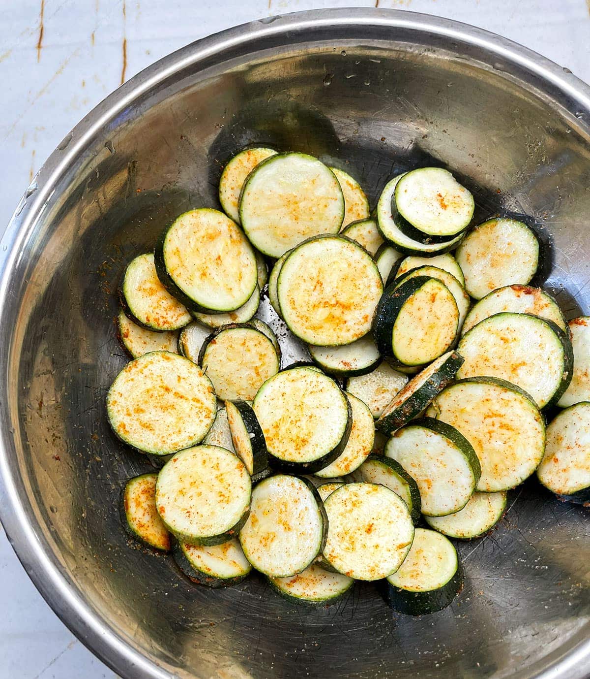 seasoned squash in silver bowl