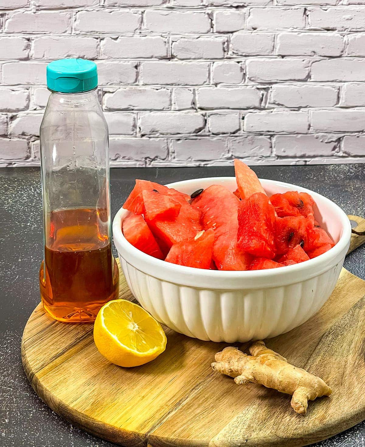 watermelon lemonade ingredients on a wooden cutting board