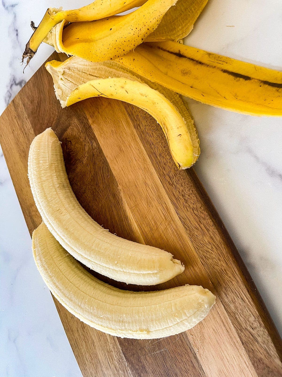peeling bananas for banana ice cream