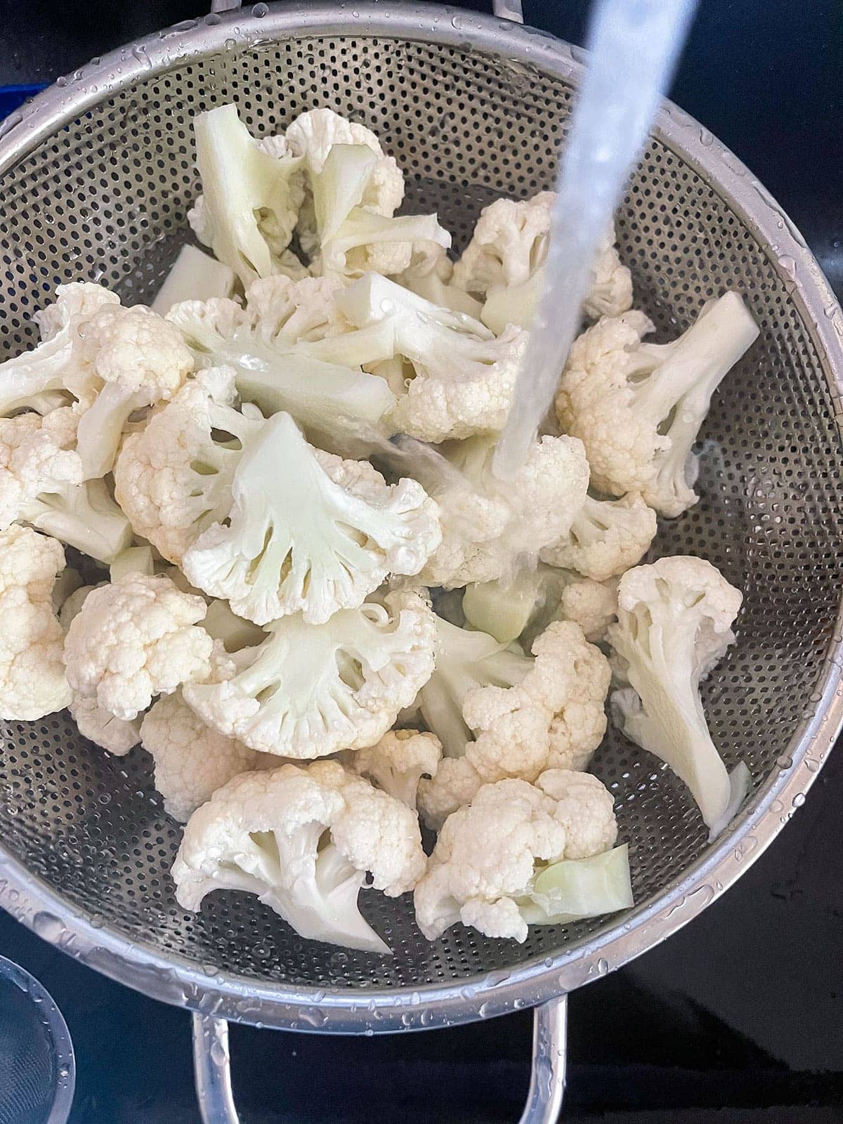 washing cauliflower florets