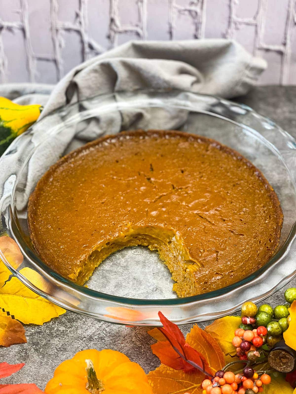 Crustless pumpkin pie, with a piece of pie removed