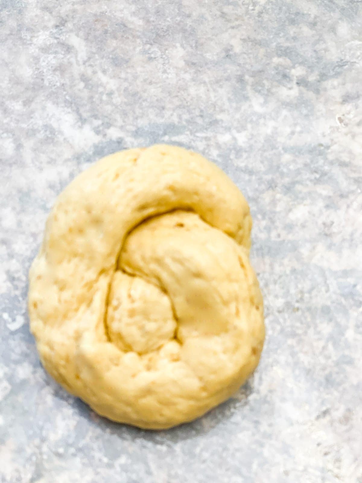 Showing how to tie garlic knots