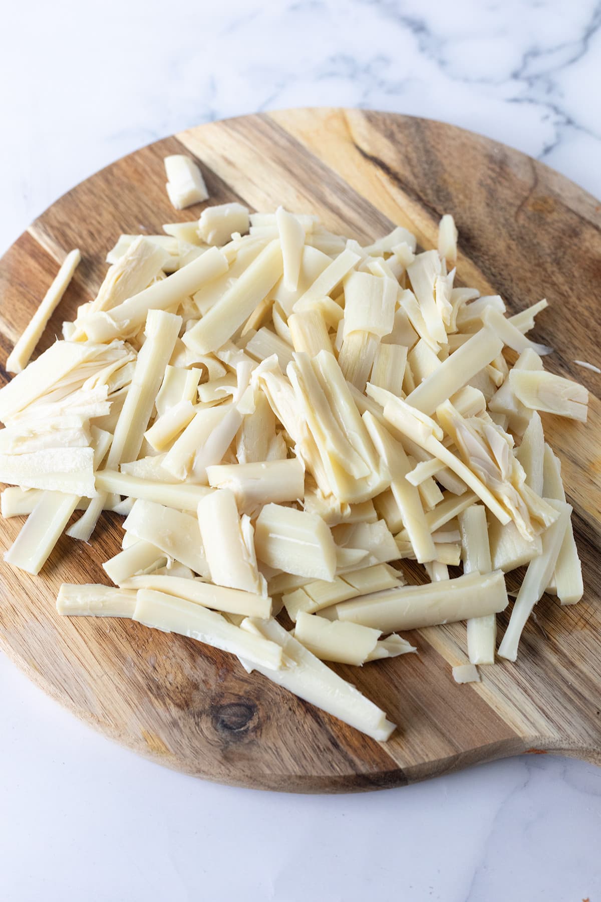 chopped hearts of palm on cutting board