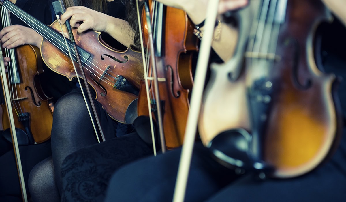 Female Violinists Preparing For Classical Concert