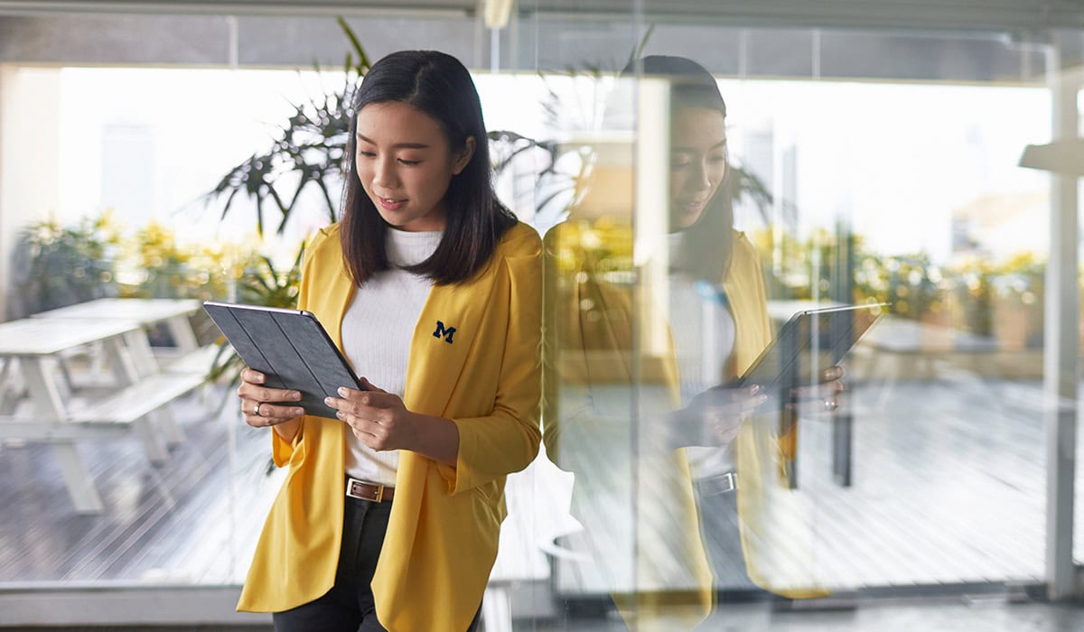 Woman holding a tablet