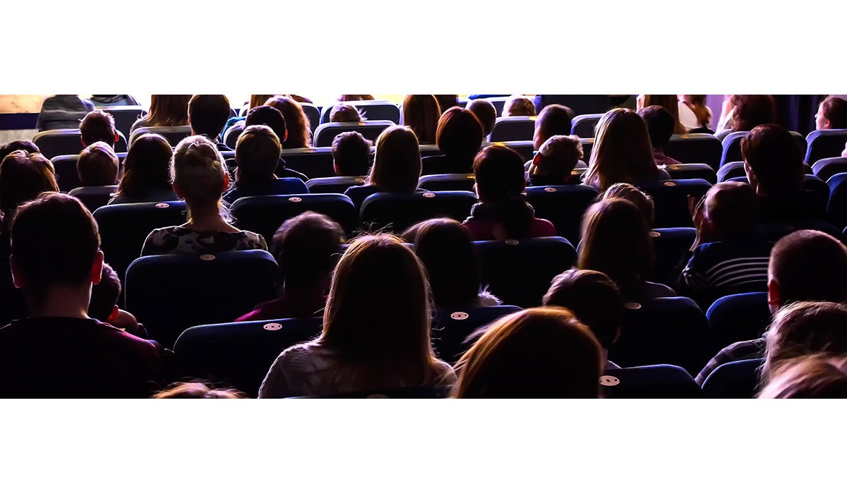 People In The Auditorium Watching The Performance