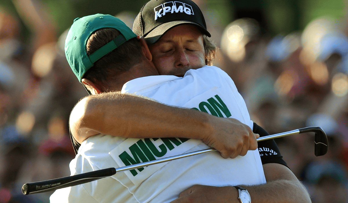 Caddie Hugging the Golfer