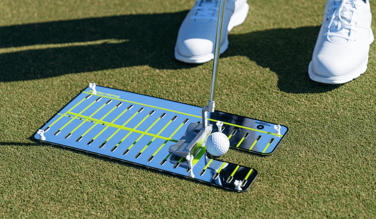 Golfer with Putting Mirror