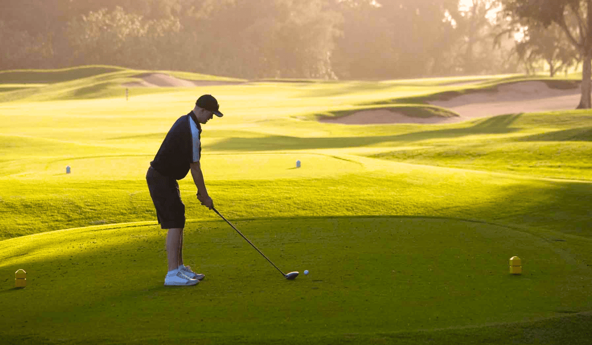 Golfer Playing with Tee Markers