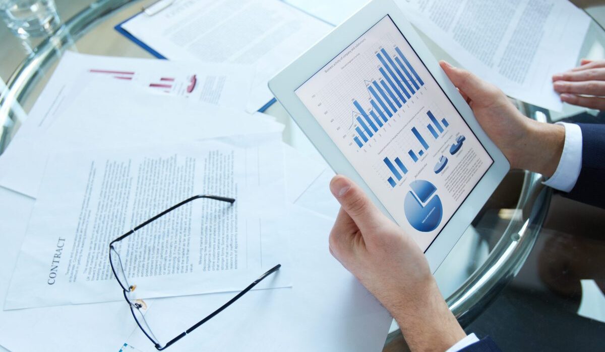 businessman-holding-tablet-with-crm-software