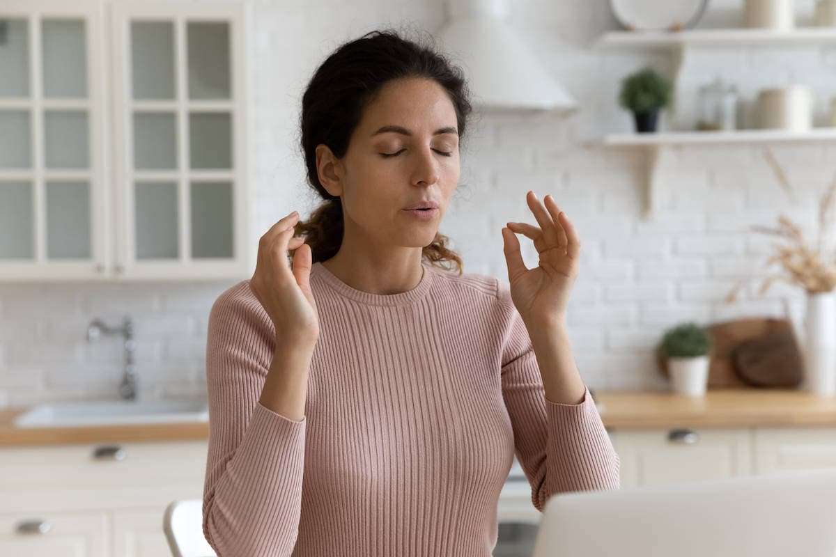 woman practising slow exhalation pranayama