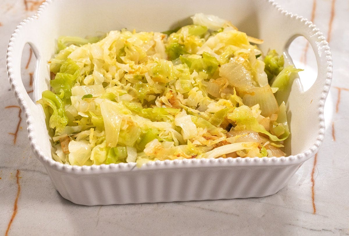 cabbage saute in a casserole pan