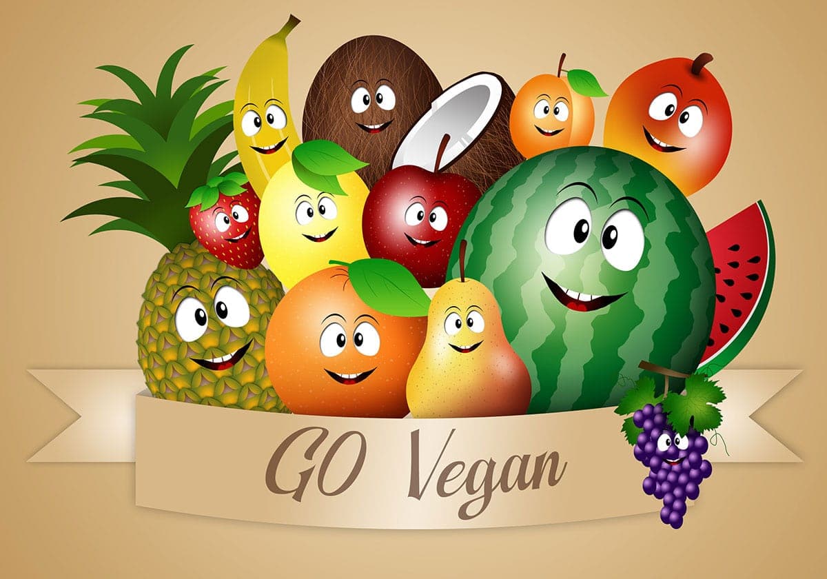 go vegan image with fruits on a brown background