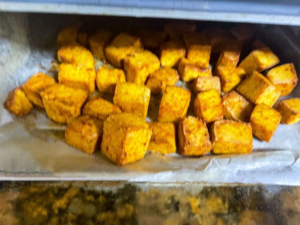 Air fryer tofu cubes in air fryer basket