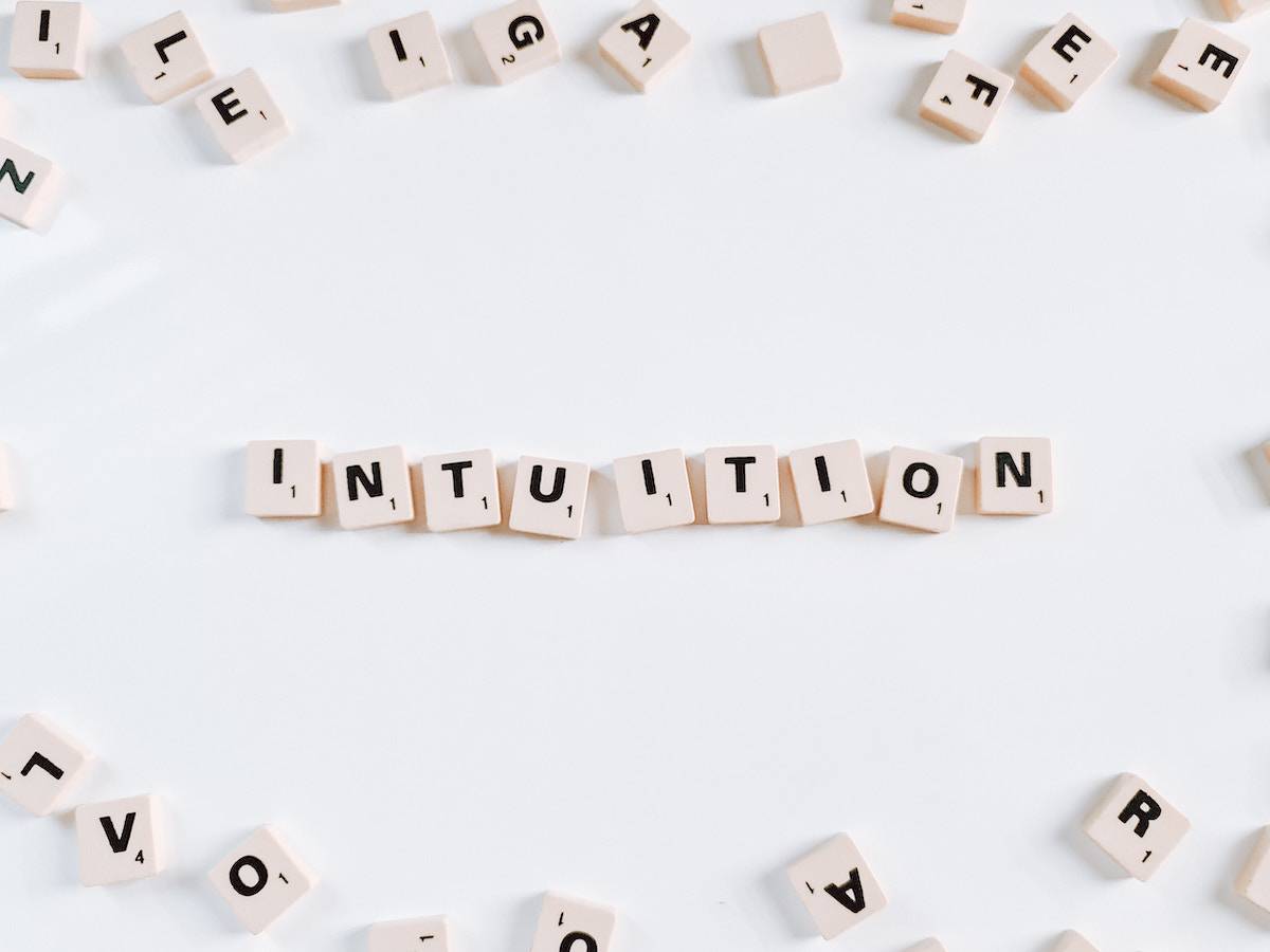 intuition spelled out in wooden letters