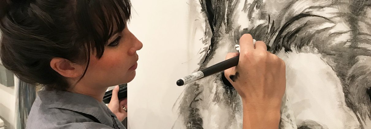 nashville artist kristin llamas painting a llama