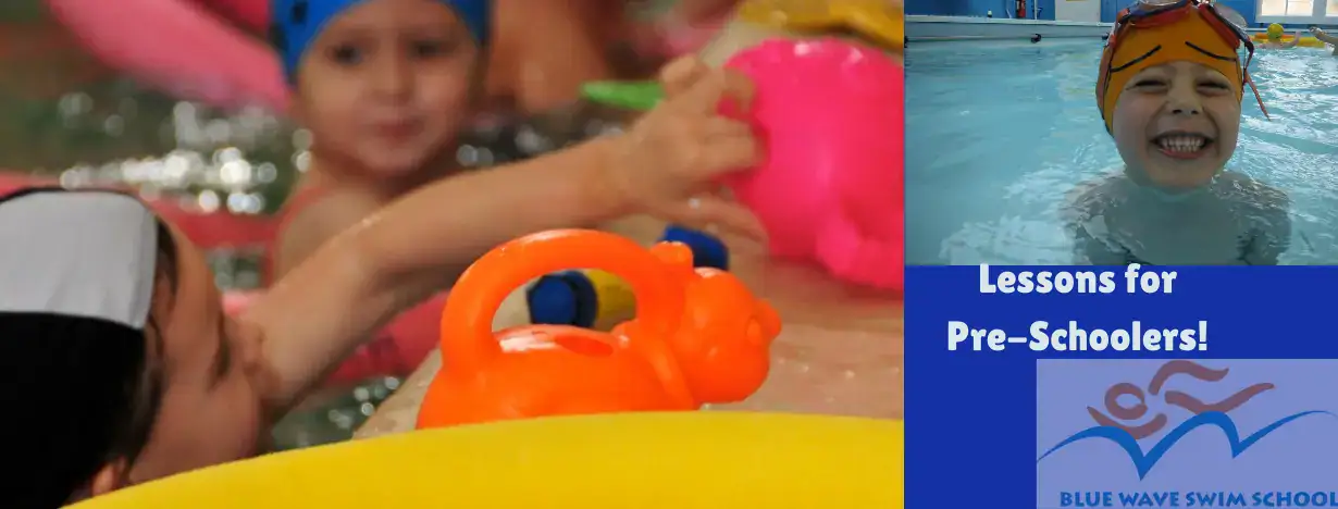 a group of 3 year old children are happy in a swimming pool holding a watering can and playing in a pre-school semi-private swim lesson at Blue Wave swim school in Wimbledon