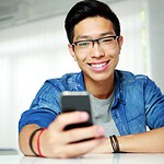 10 Proven Online Dating Strategies to Boost Your Profile and Attract the Right Matches 15 man texting and smiling