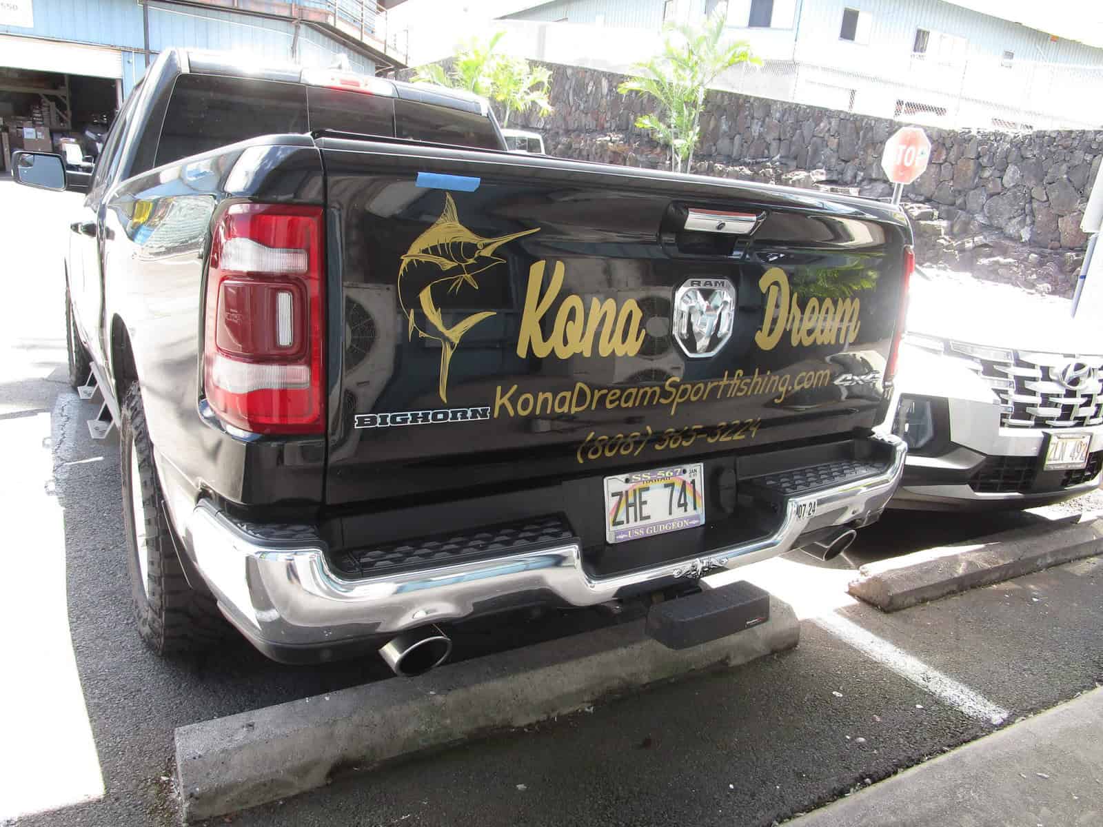 truck with Kona Dream Sportfishing decals, promoting professional fishing services.
