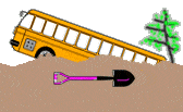school bus buried in sand