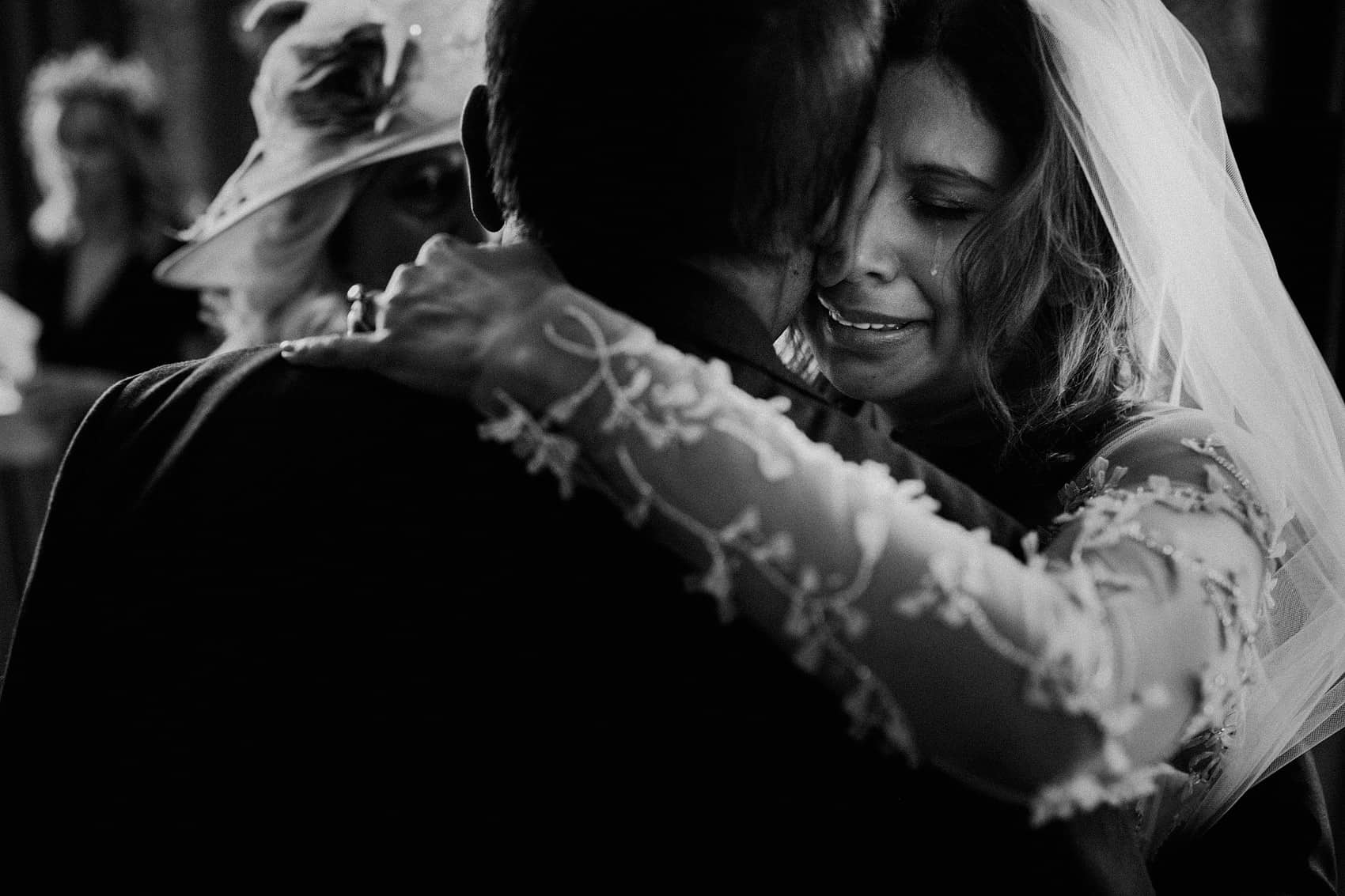 emotional wedding photography of bride and dad