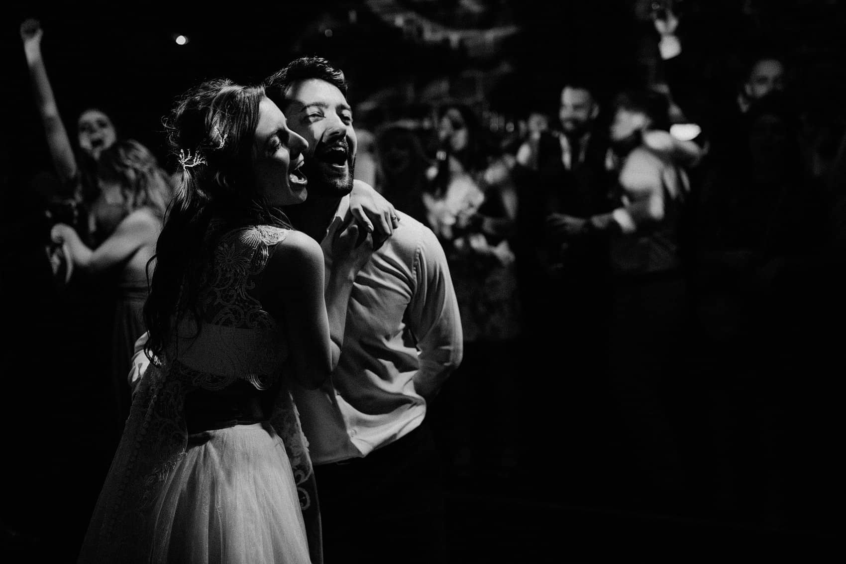 bride and groom first dance black and white photo