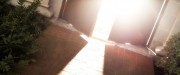 Light pouring through an opening door