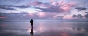 Man alone on a beach