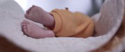 Image of baby's feet from The Drop Box documentary trailer