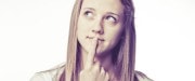Young woman pondering a question