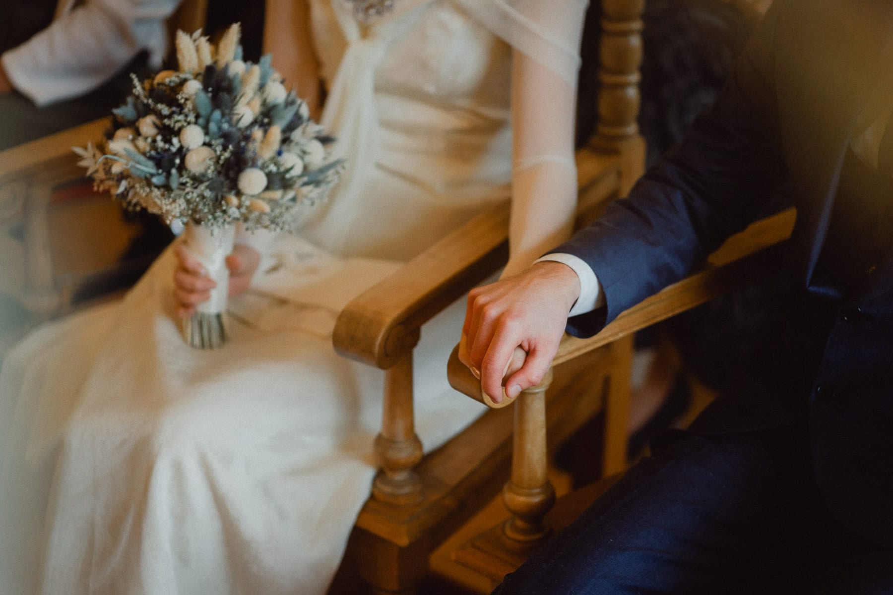 Detail photo of hands during wedding ceremony