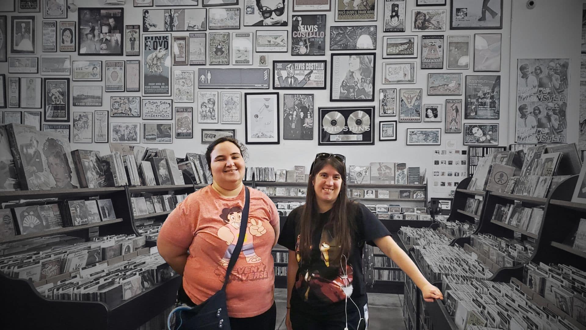 Two roommates at a record store