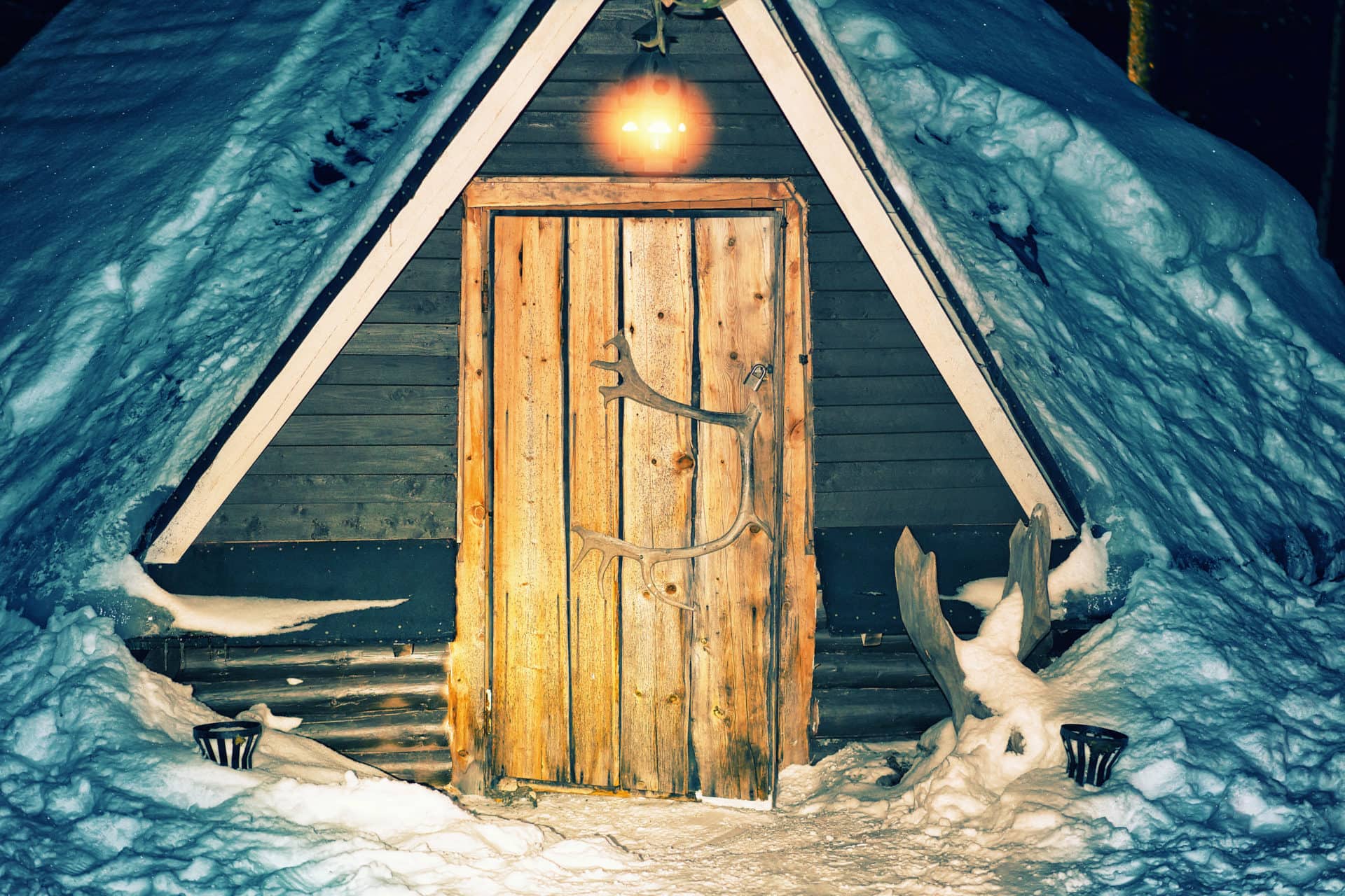 Entrance into Lappish house winter Lapland night snowfall