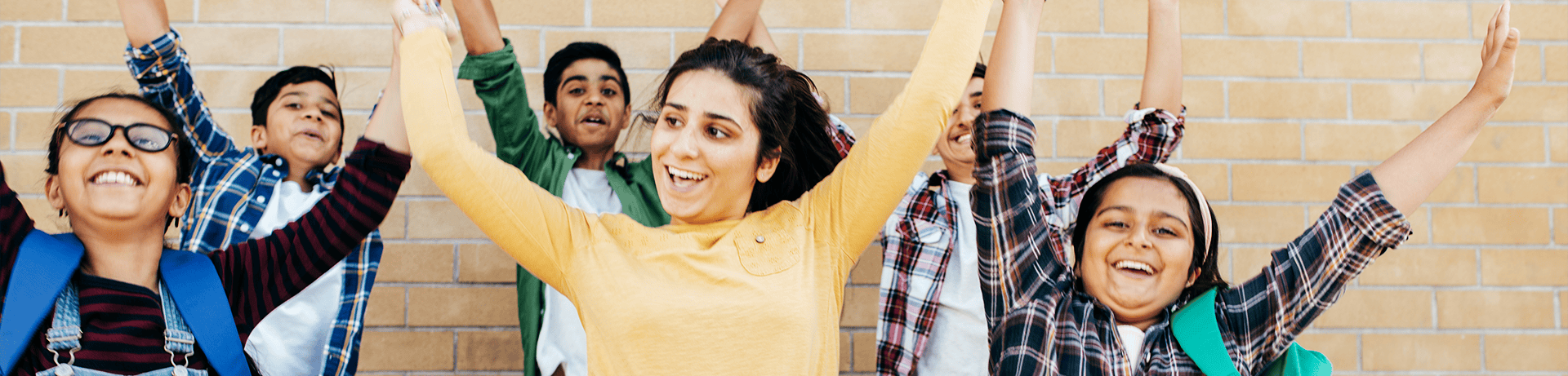 CFC Learning Centers school kids jumping
