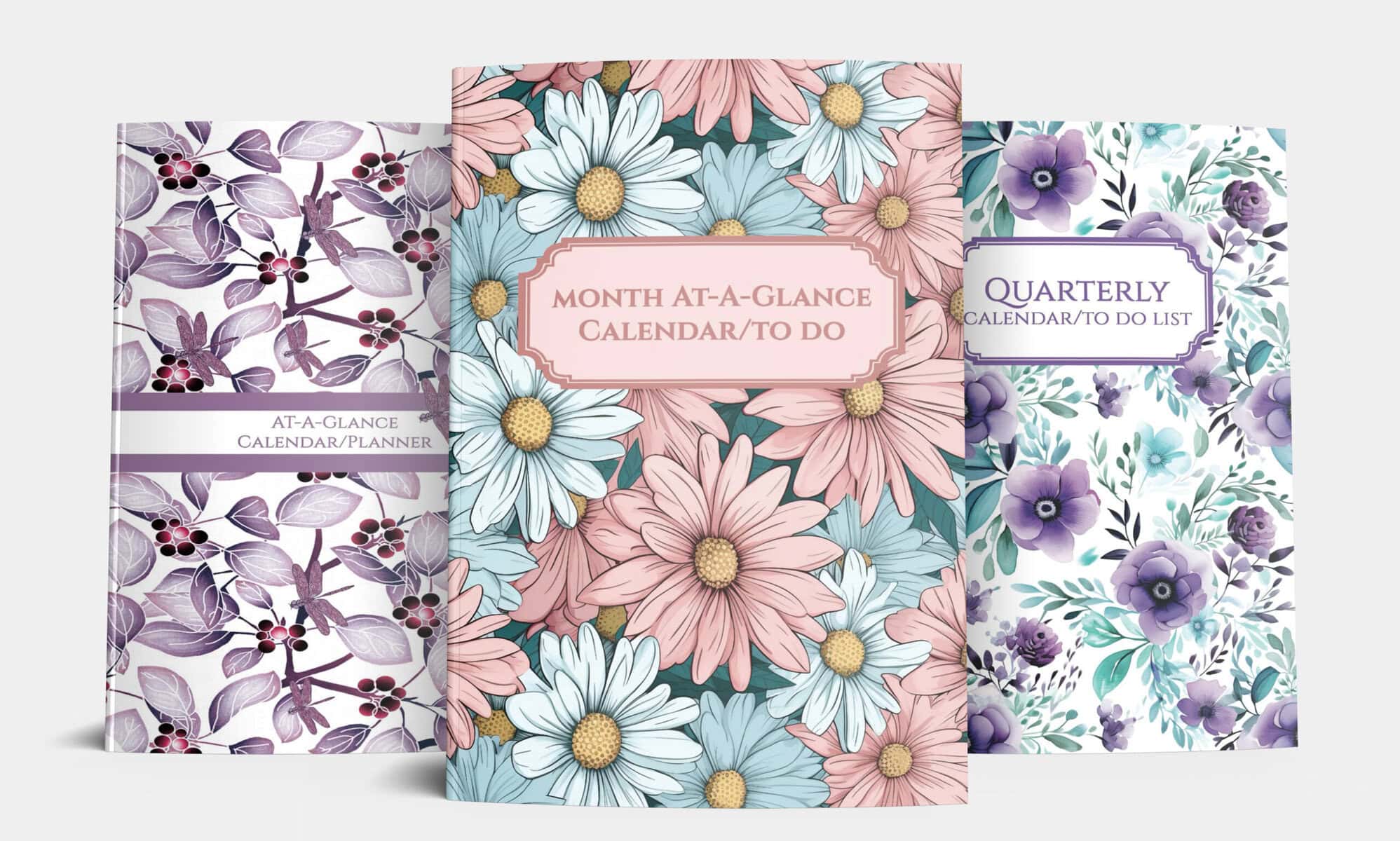 Three planners with floral covers: Month At-A-Glance Calendar To Do, Quarterly Calendar To Do List, and At-A-Glance Calendar Planner.