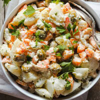 This Creamy Potato Salad with Prawns is my grandma's staple potato salad. It calls for potatoes, carrots, green olives and prawns cut into pieces, all seasoned with homemade mayonnaise and a touch of fresh chopped parsley. It's creamy and filling without being heavy, healthy, nutritious and delicious. It's the ultimate summer salad and you can also prepare it in advance! | Paula's Apron Recipe