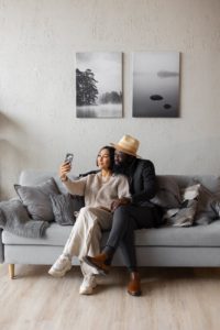 Decoding Love: Signs He is Serious About You 6 multiethnic couple having online conversation via smartphone