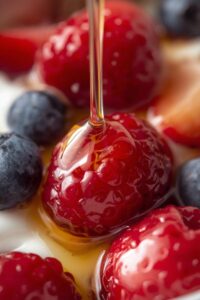 17 Easy Date Night Ideas That Bring You Closer 19 closeup image of yoghurt with honey and berries,