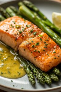 15 Recipes That May Support Healthy Erections Naturally 9 image of garlic butter salmon with asparagus,