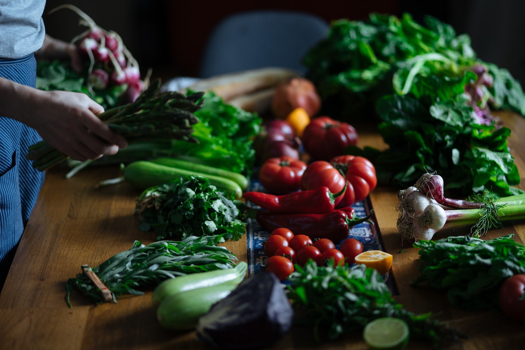 Woman cooking fresh vegetables Woman cooking fresh vegetables