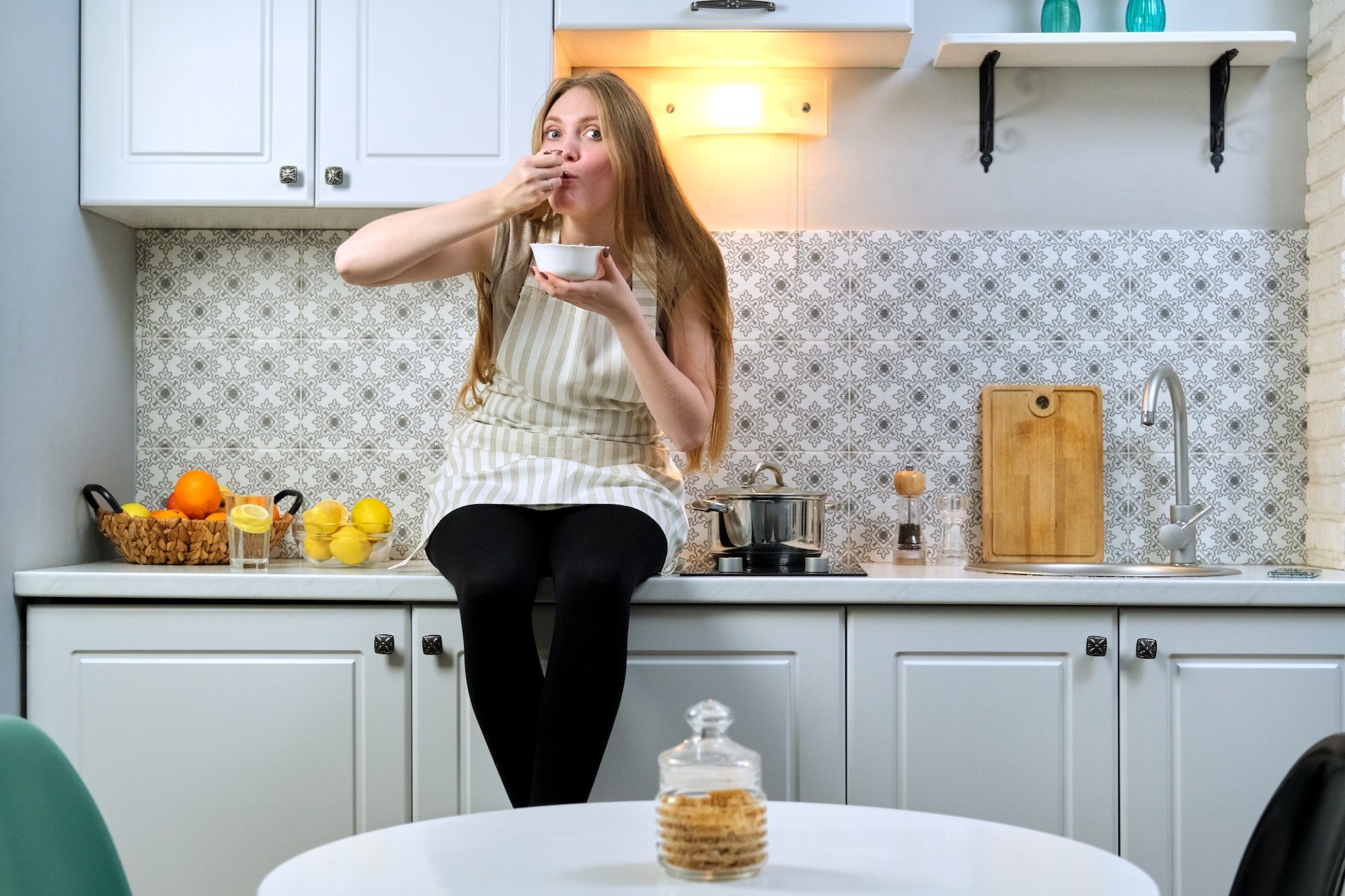 Girl with appetite eating homemade freshly prepared food