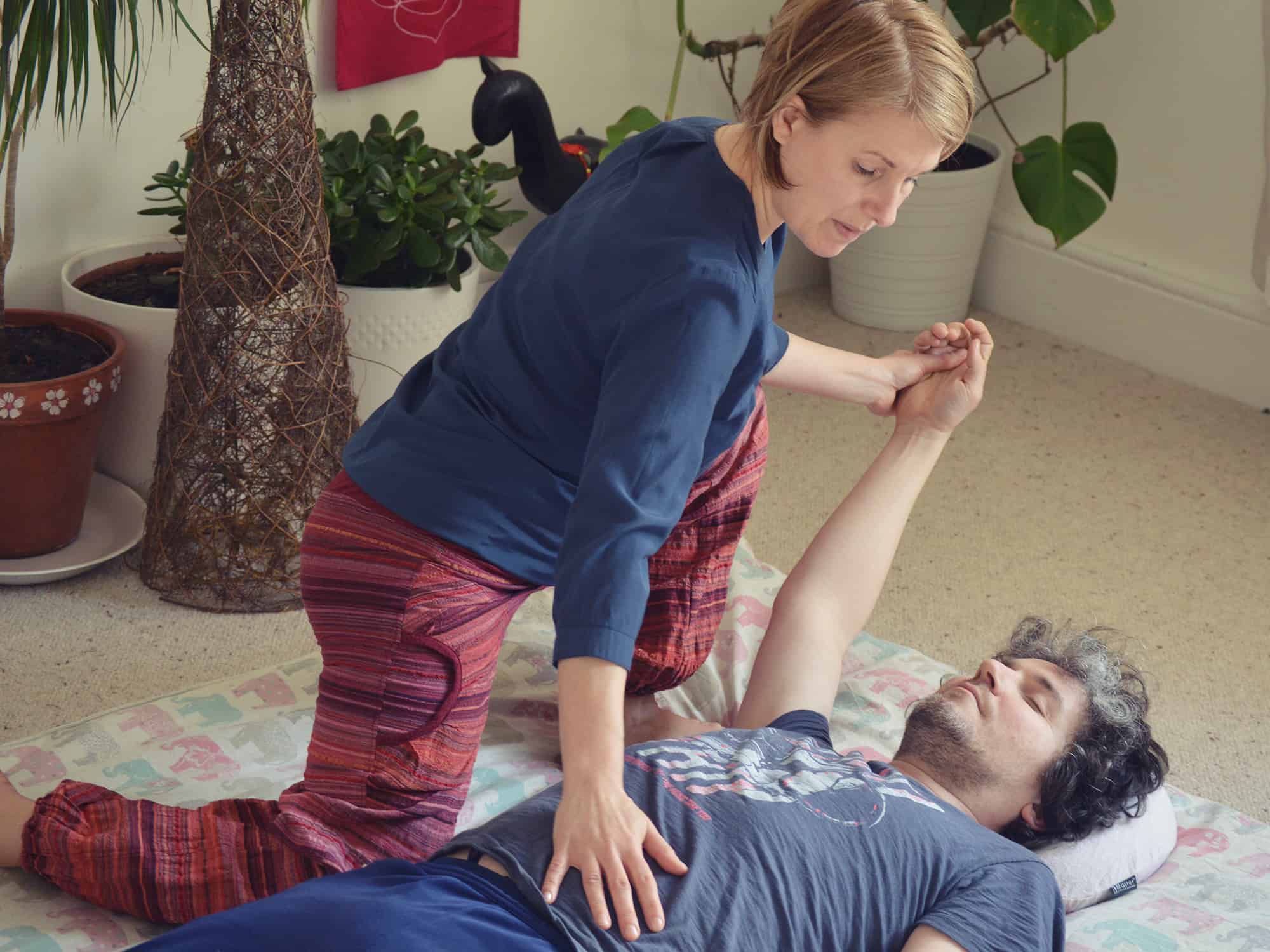 Ludmila practising a shiatsu massage.