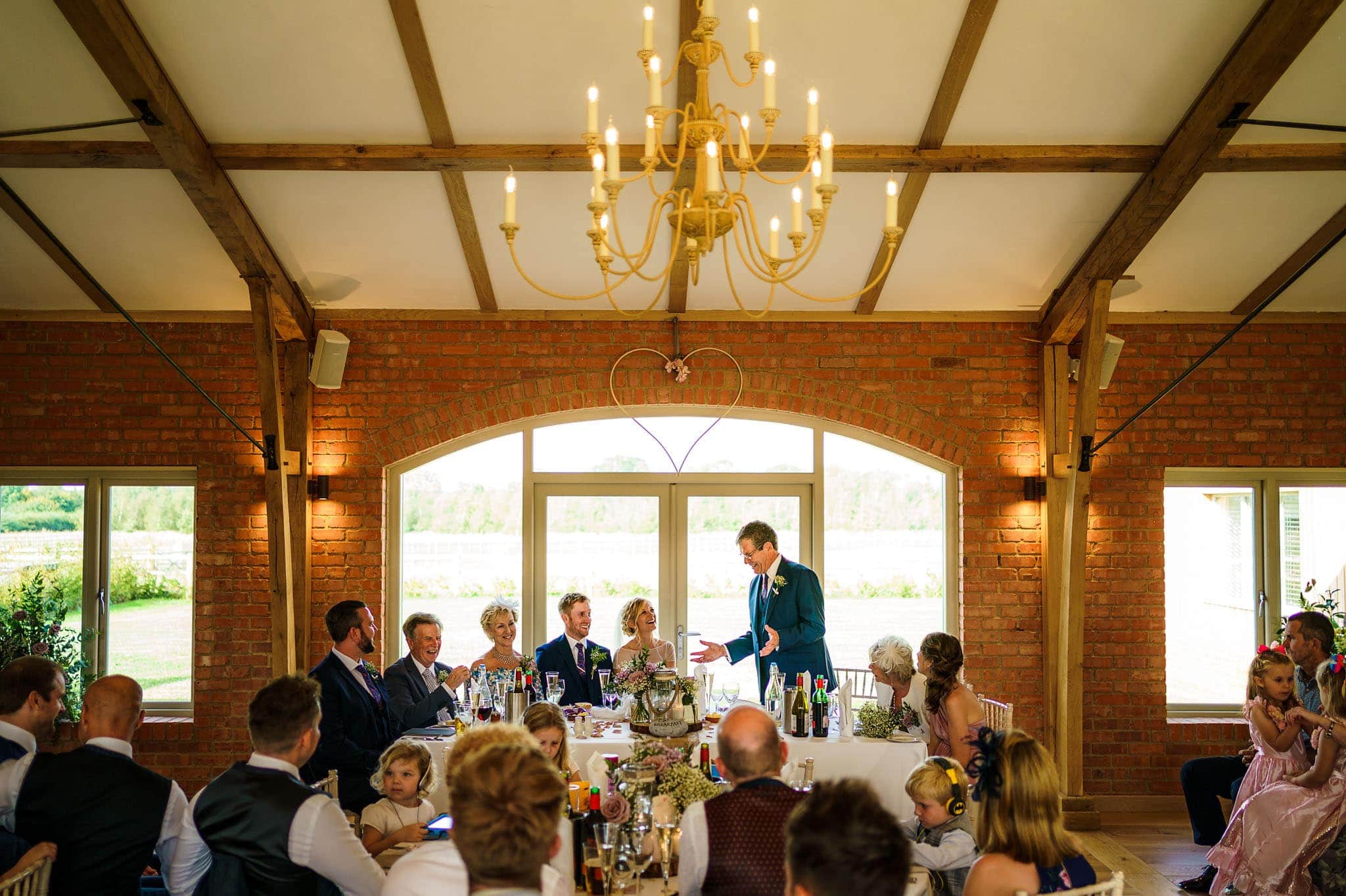 wide shot of the room during the father of the bride's speech