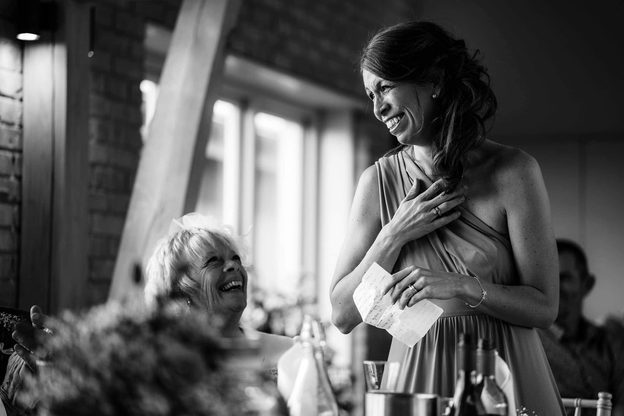 the bride's sister giving a teary speech