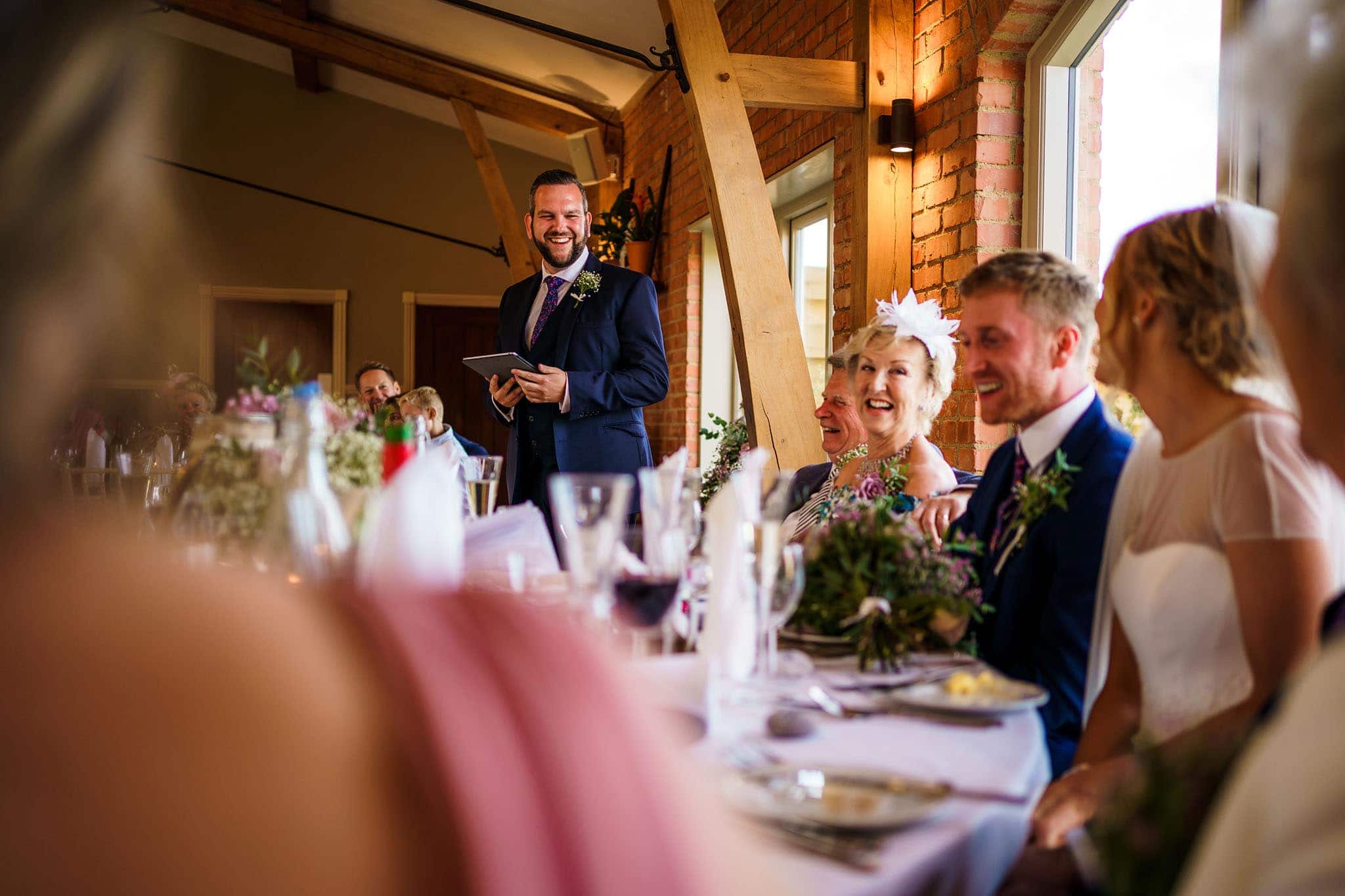 the best man embarrassing the groom during his speech