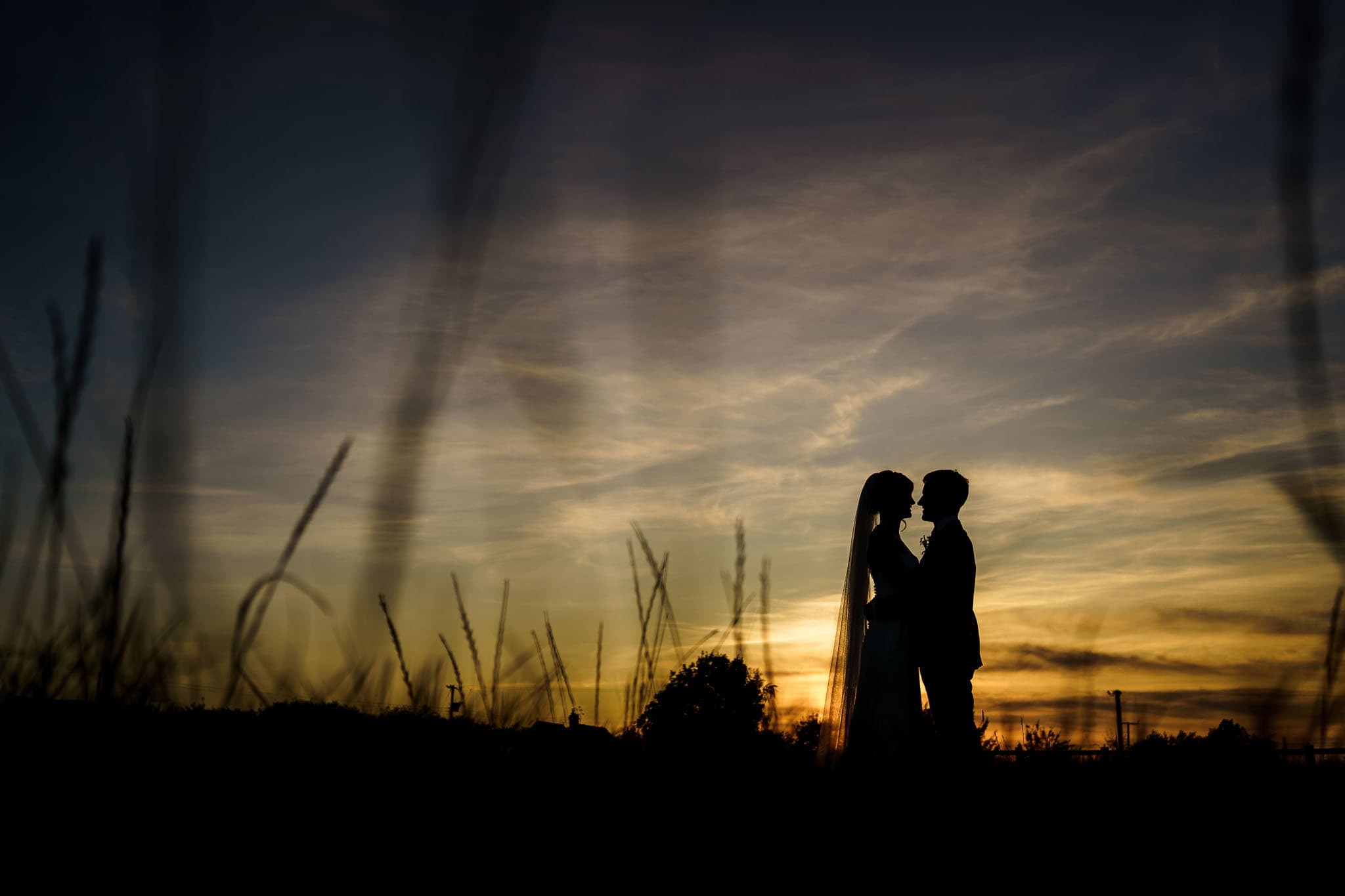 sunset silhouette couple portrait at Cider Mill Barns