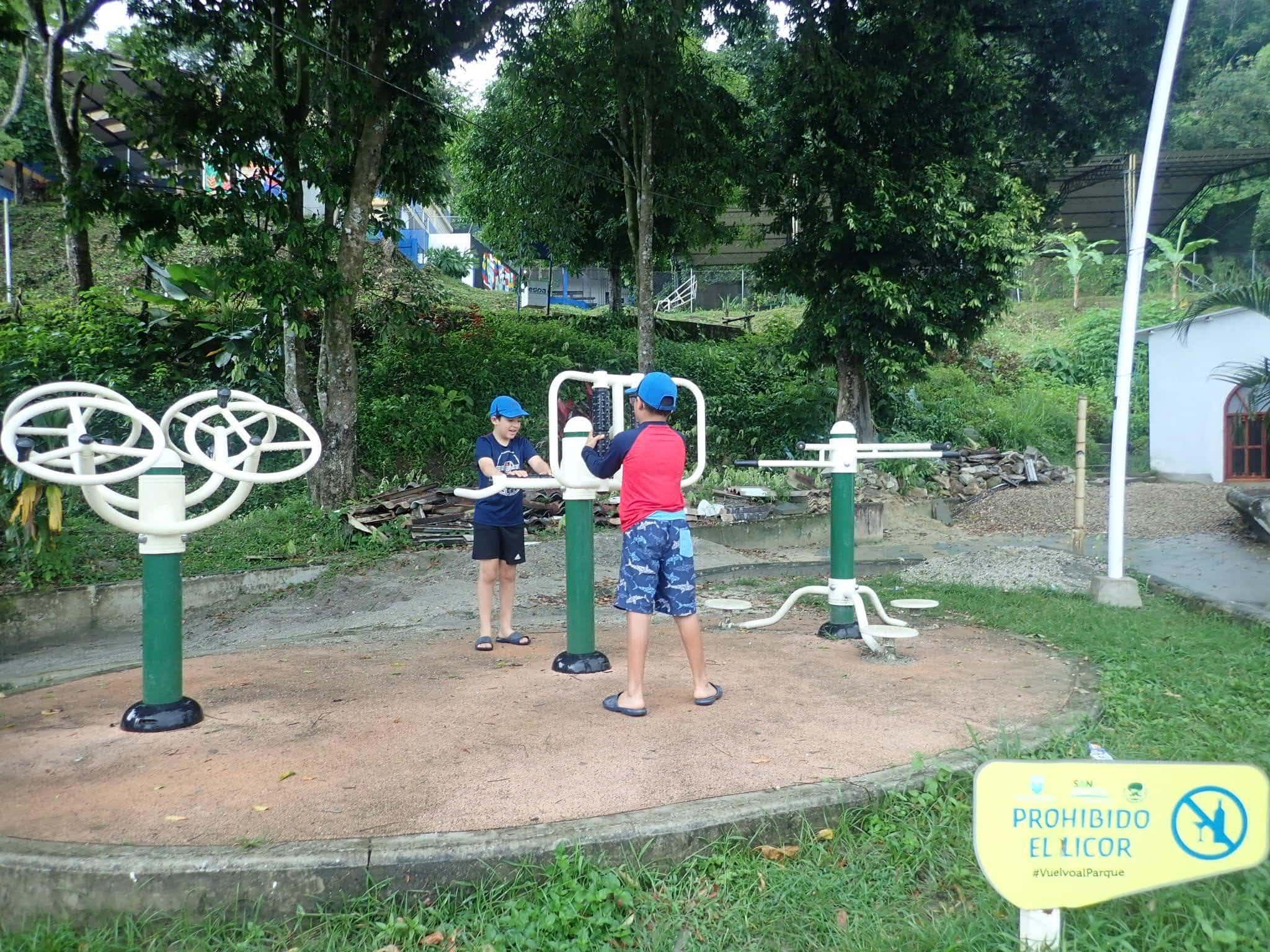 Mateo and Marco at the workout playground in Minca, Colombia