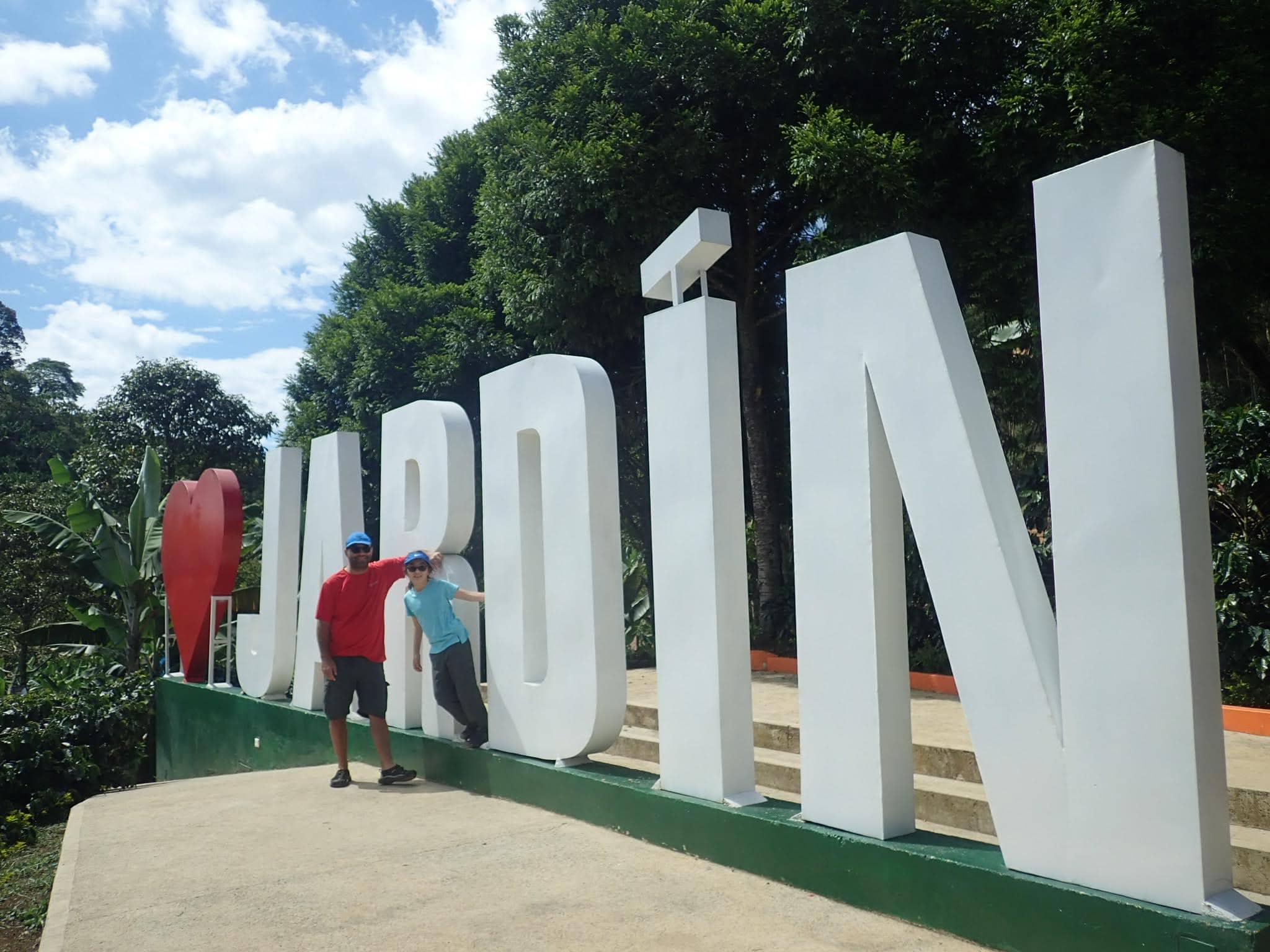 Daniela and Joe at the Jardin sign in Colombia