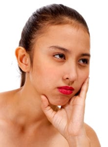 Understanding Benching in Relationships: Signs, Impact, and How to Navigate It 5 worried and unhappy girl frowning z1ikkBPO